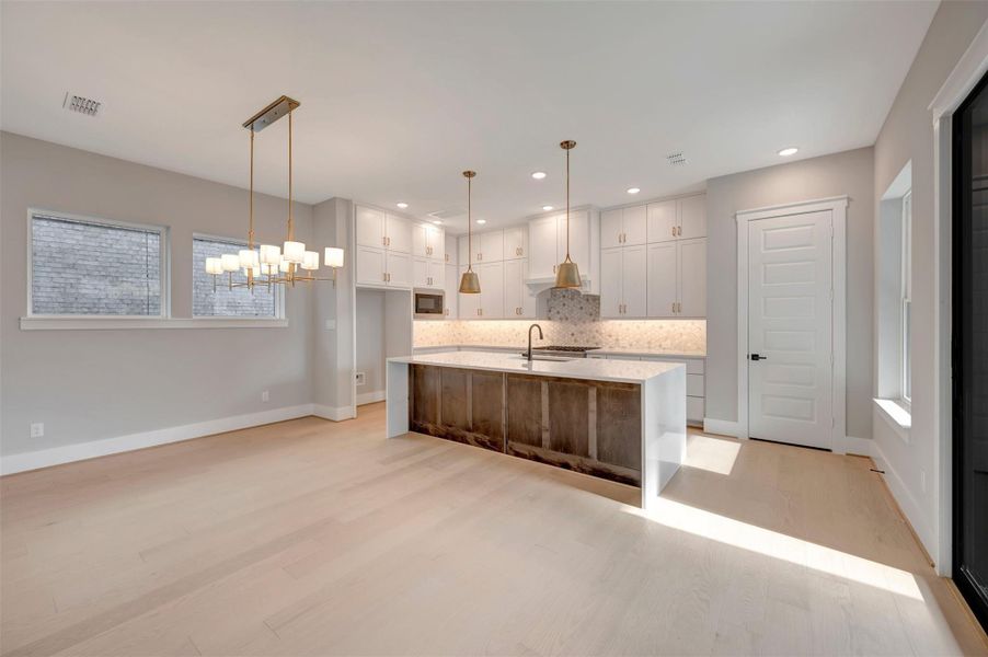Furnished interior view inside a new home in Easthaven at Bridgeland Central - Vision Collection, Cypress (Image 12).