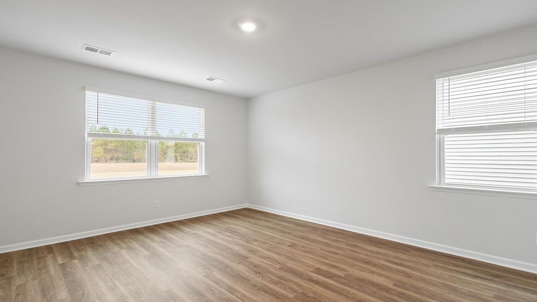 Spacious, unfurnished interior of a new home in The Cove at Mallard Crossing, Summerville (Image 25).