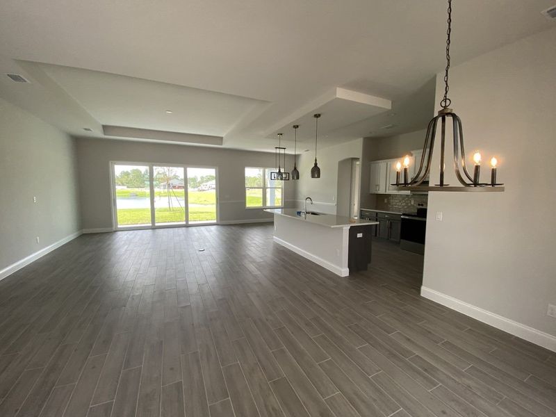 Representative unfurnished interior of a home built from the Oakmont by Paytas Homes in The Reserve at Victoria, Deland (Image 10).