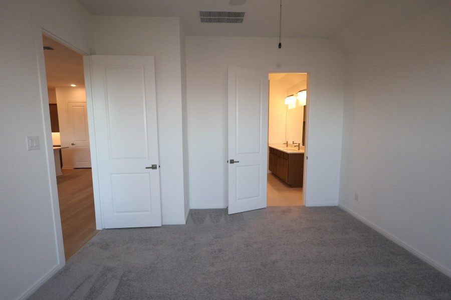 Spacious, unfurnished interior of a new home in Meridiana - Terrace Collection, Manvel (Image 14).