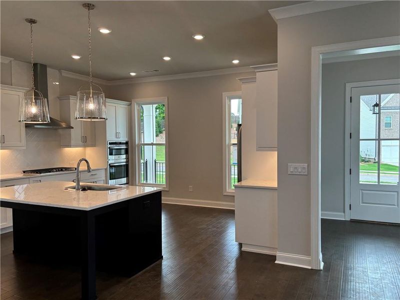 Furnished interior view inside a new home in Brackley Single Family, Cumming (Image 18).