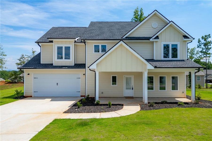 Front exterior of a new home in , Toccoa, GA, highlighting curb appeal (Image 32). Front exterior of a new home in , Toccoa, GA, highlighting curb appeal (Image 32).
