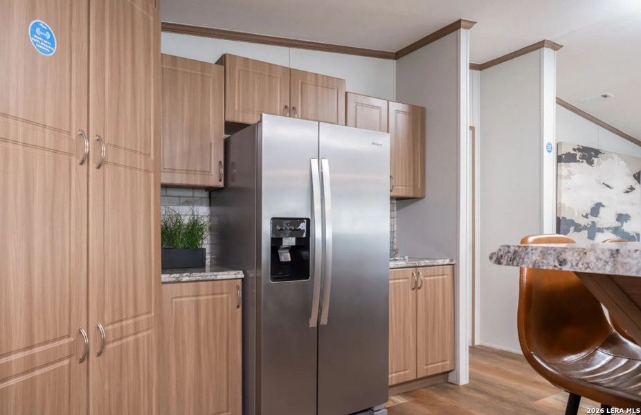 Furnished interior view inside a new home in , Elmendorf (Image 12).