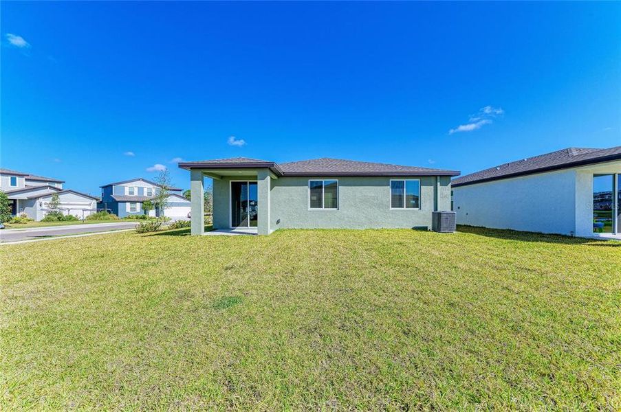 Exterior details and patio area of a home in Magnolia Bay - Classic Series, Nokomis (Image 27).
