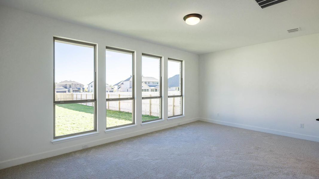 Spacious, unfurnished interior of a new home in Santa Rita Ranch 50', Liberty Hill (Image 8). Spacious, unfurnished interior of a new home in Santa Rita Ranch 50', Liberty Hill (Image 8).