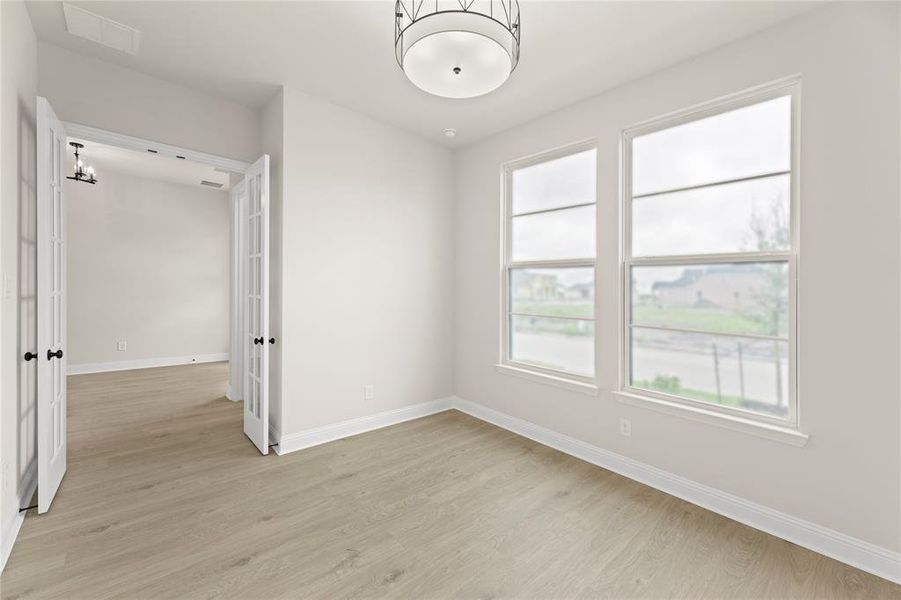 Spacious, unfurnished interior of a new home in Talia, Mesquite (Image 31). Spacious, unfurnished interior of a new home in Talia, Mesquite (Image 31).