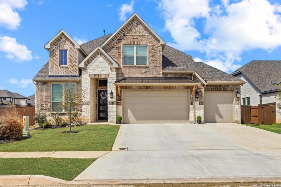 Front exterior of a new home in Corley Farms, Boerne, TX, highlighting curb appeal (Image 21).