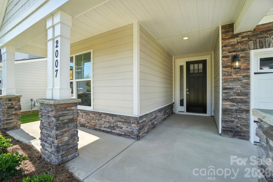 Exterior details and patio area of a home in Heritage - 55+ Community, Indian Trail (Image 4).