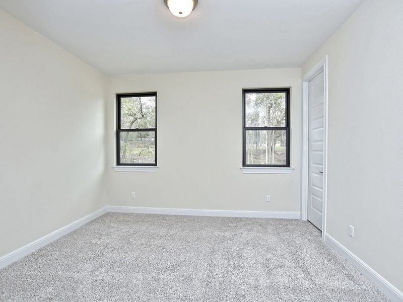 Representative unfurnished interior of a home built from the Avalon by Giddens Homes in Scofield Farms Estates, Georgetown (Image 157).