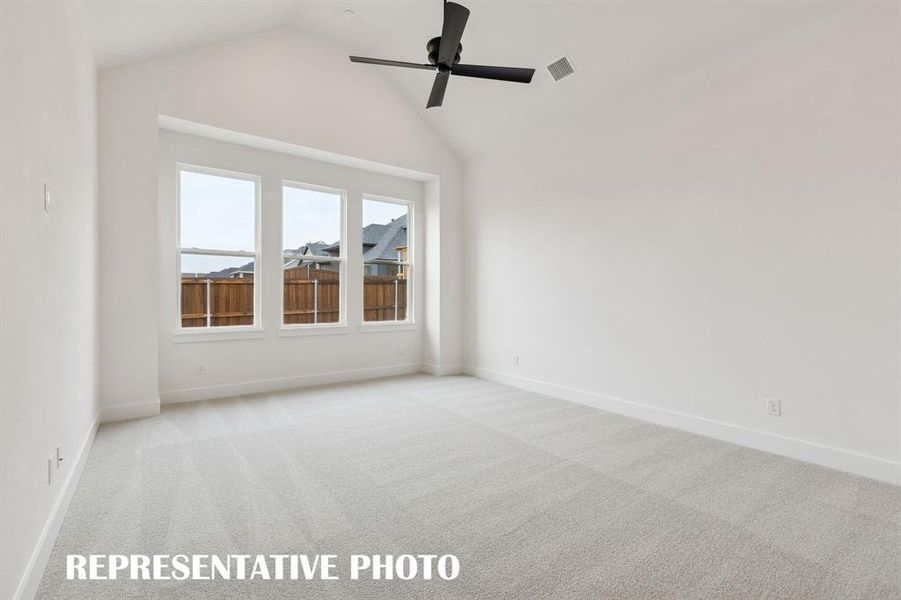 Your dreamy new owner's suite features high ceilings, a wall of windows, plush carpeting and so much more!  REPRESENTATIVE PHOTO