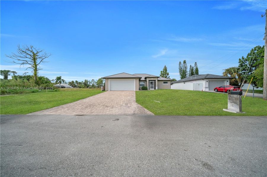 Exterior details and patio area of a home in , Lehigh Acres (Image 28). Exterior details and patio area of a home in , Lehigh Acres (Image 28).