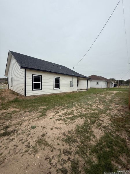 Exterior details and patio area of a home in , Beeville (Image 3).