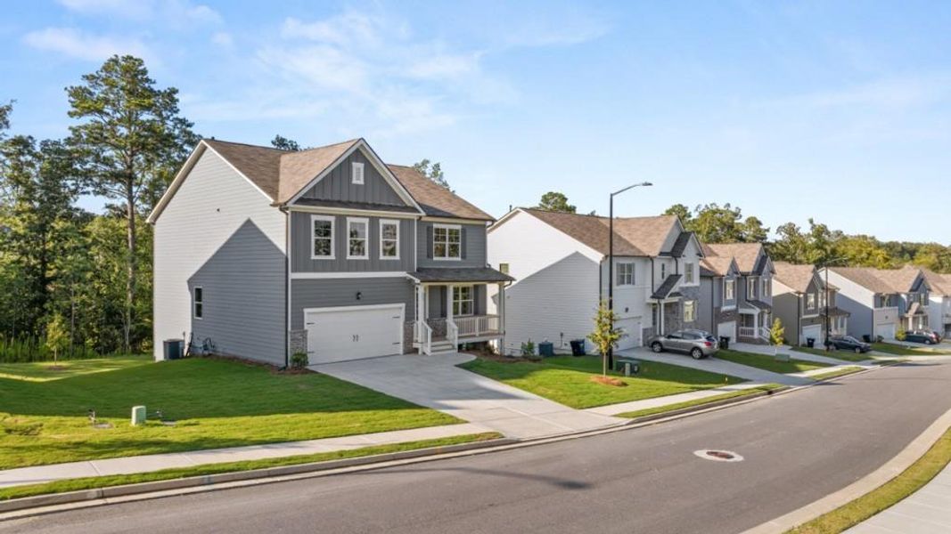 Front exterior of a new home in Lost Creek, Dallas, GA, highlighting curb appeal (Image 2).