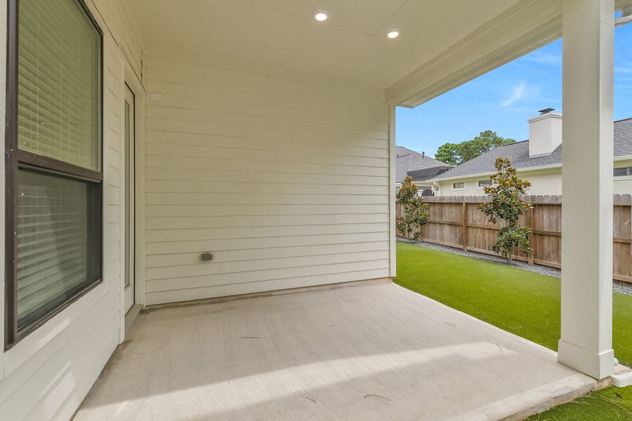 Exterior details and patio area of a home in Summer Place  35', Montgomery (Image 25).