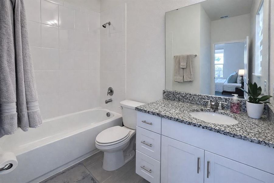 Furnished interior view inside a new home in Waterleigh, Winter Garden (Image 14).