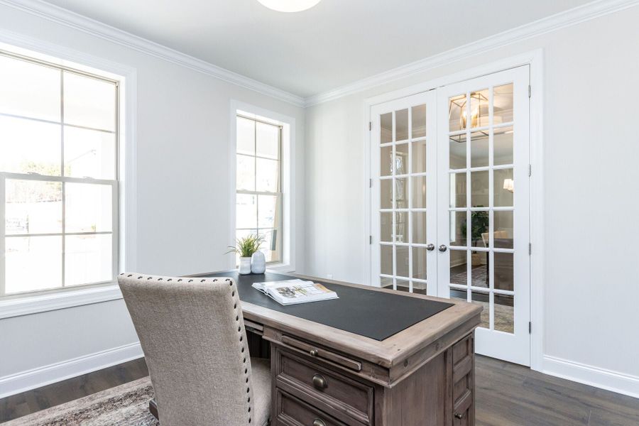 Representative furnished interior of a home built from the Azalea American Farmhouse by Homes by Dickerson in The View, Durham (Image 5).