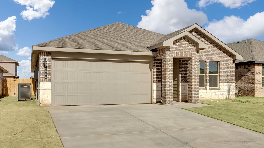 Front exterior of a new home in Terra Vista, Lubbock, TX, highlighting curb appeal (Image 15).