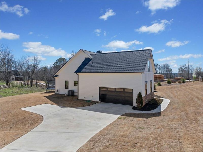 Front exterior of a new home in , Dallas, GA, highlighting curb appeal (Image 2).