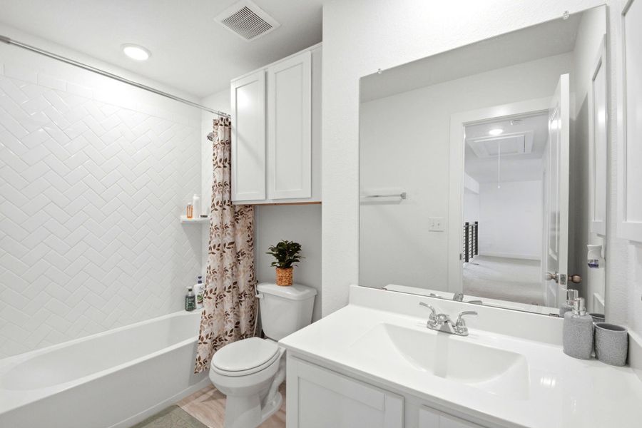 Furnished interior view inside a new home in Massey Oaks, Pearland (Image 36).