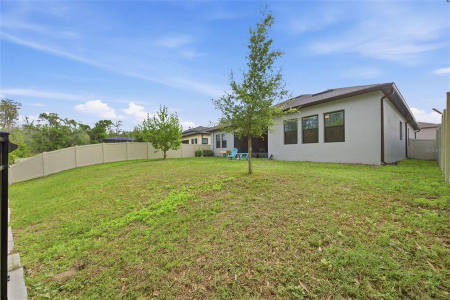Exterior details and patio area of a home in , Land O' Lakes (Image 4).