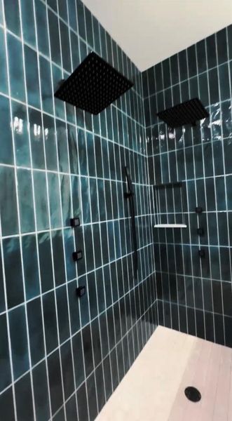 Full bath featuring tiled shower