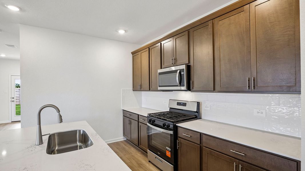 Furnished interior view inside a new home in Briarwood, Elgin (Image 8).