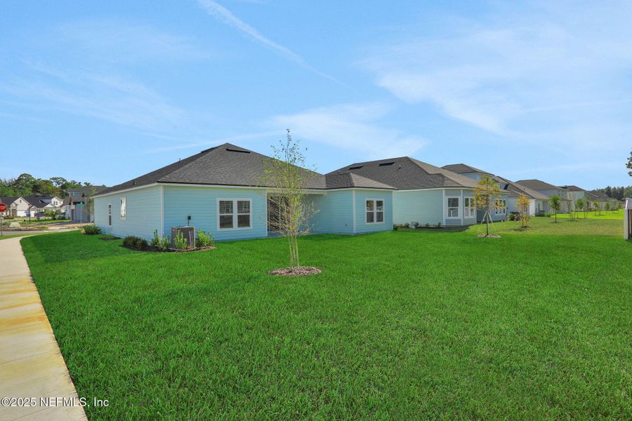 Exterior details and patio area of a home in Silver Landing at SilverLeaf, St. Augustine (Image 24).
