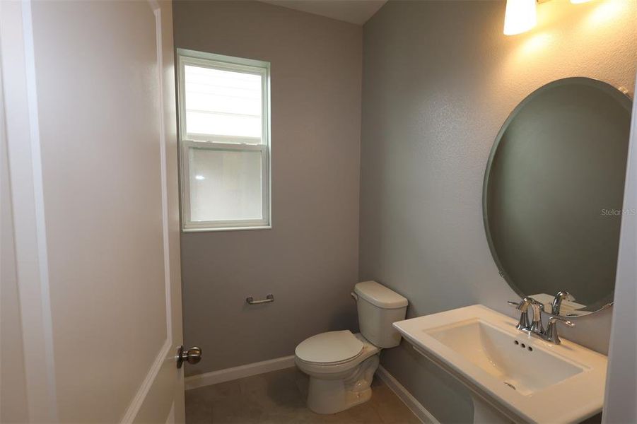 Furnished interior view inside a new home in Center Lake on the Park, St. Cloud (Image 14).