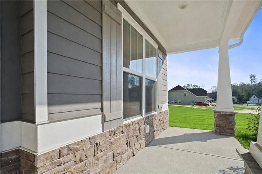 Exterior details and patio area of a home in Stratford at NatureWalk, Dallas (Image 3).