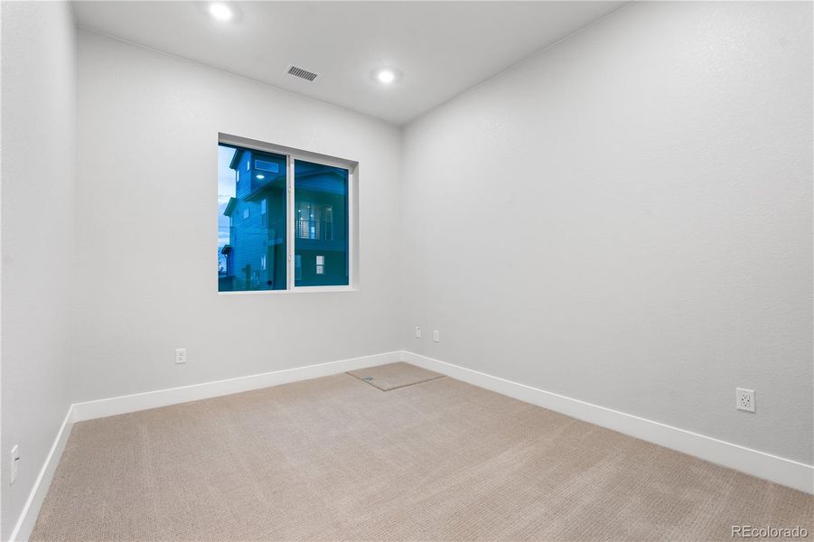 Spacious, unfurnished interior of a new home in Tribute at Lyric, Lone Tree (Image 25).