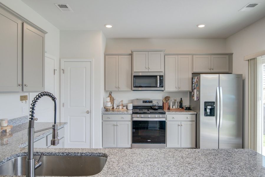 Furnished interior view inside a new home in , Summerville (Image 14).