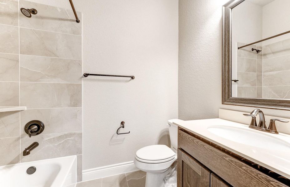 Furnished interior view inside a new home in The Woodlands Hills 65′, Willis (Image 30).