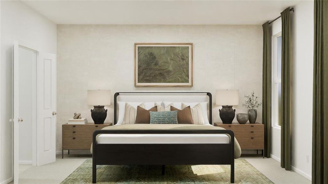 Bedroom featuring light carpet and baseboards