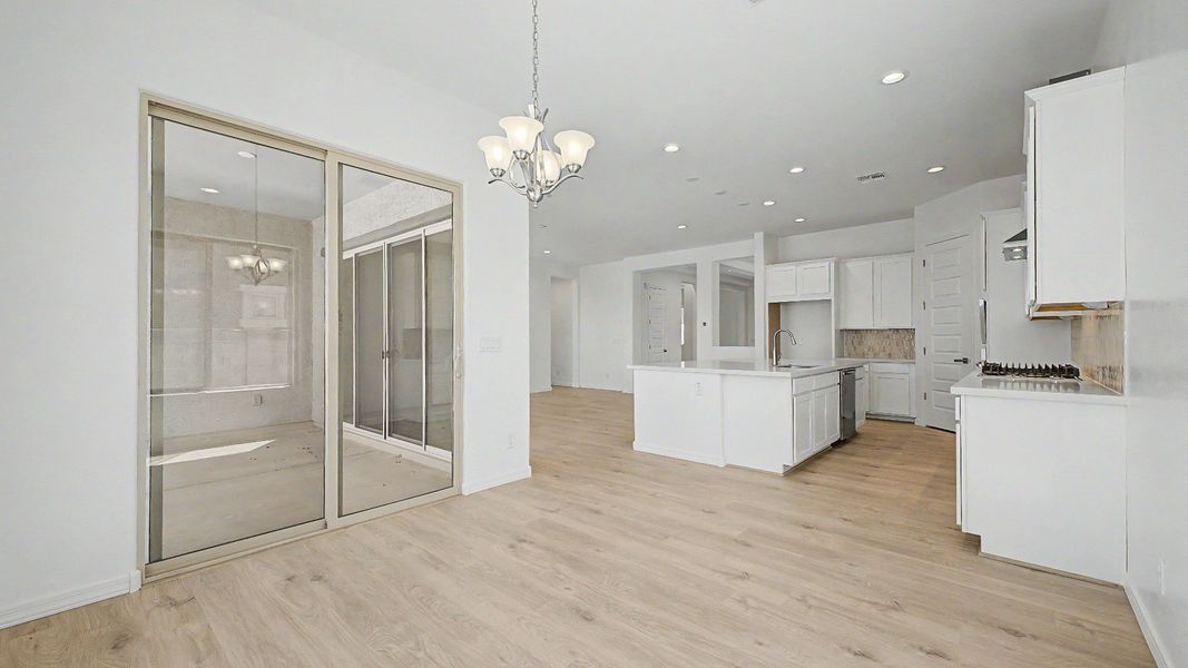 Furnished interior view inside a new home in Windrose, Waddell (Image 13).
