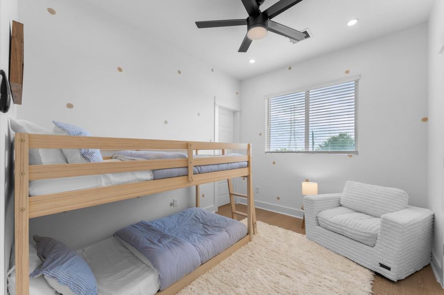 This second secondary bedroom, located near the primary suite, offers both comfort and convenience with its own private ensuite bathroom. The room is well-sized and versatile, ideal for use even as a play area. Large windows invite natural light, creating a bright and welcoming atmosphere, while the ensuite bathroom adds a touch of privacy and functionality. Its proximity to the primary bedroom makes it perfect for keeping loved ones close, while still providing independent space and comfort. This second secondary bedroom, located near the primary suite, offers both comfort and convenience with its own private ensuite bathroom. The room is well-sized and versatile, ideal for use even as a play area. Large windows invite natural light, creating a bright and welcoming atmosphere, while the ensuite bathroom adds a touch of privacy and functionality. Its proximity to the primary bedroom makes it perfect for keeping loved ones close, while still providing independent space and comfort.