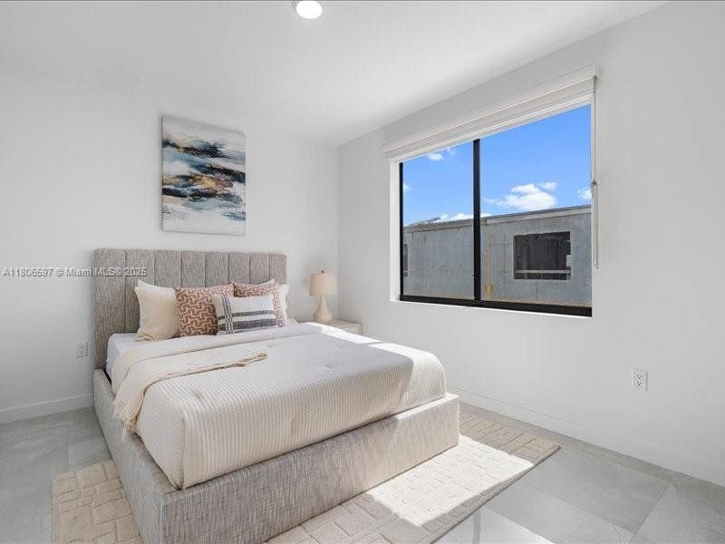 Furnished interior view inside a new home in On Grandville, Homestead (Image 17).