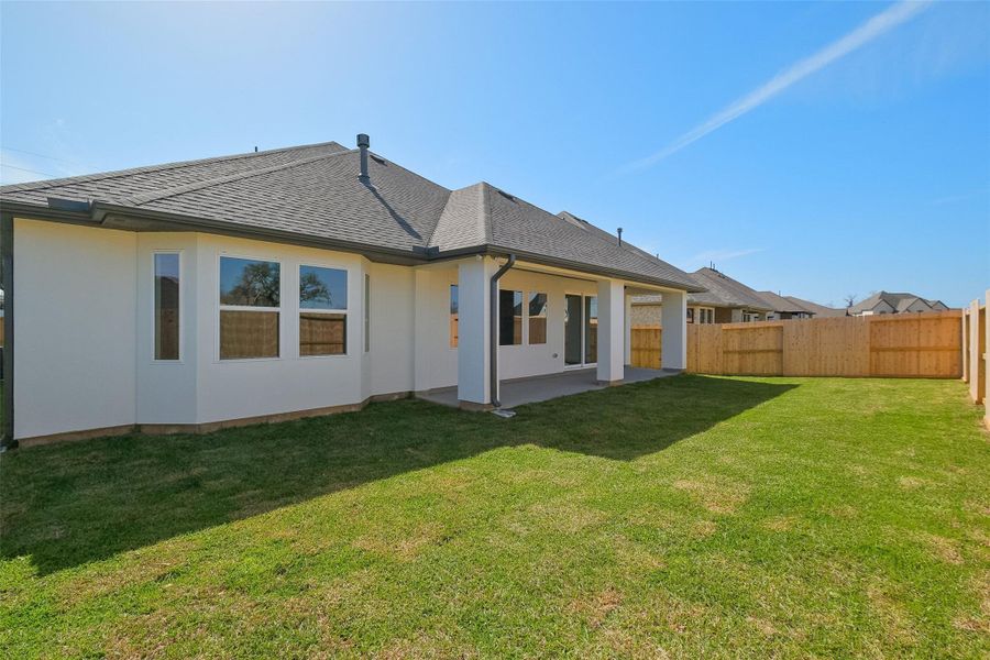 Exterior details and patio area of a home in Sienna 65', Missouri City (Image 28).