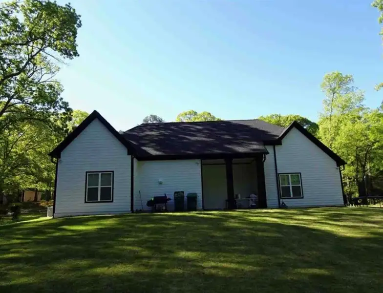 Exterior details and patio area of a home in , Riverdale (Image 3).