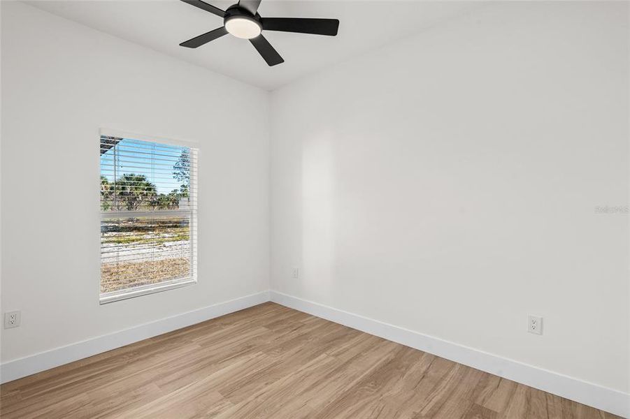 Spacious, unfurnished interior of a new home in , Okeechobee (Image 32).
