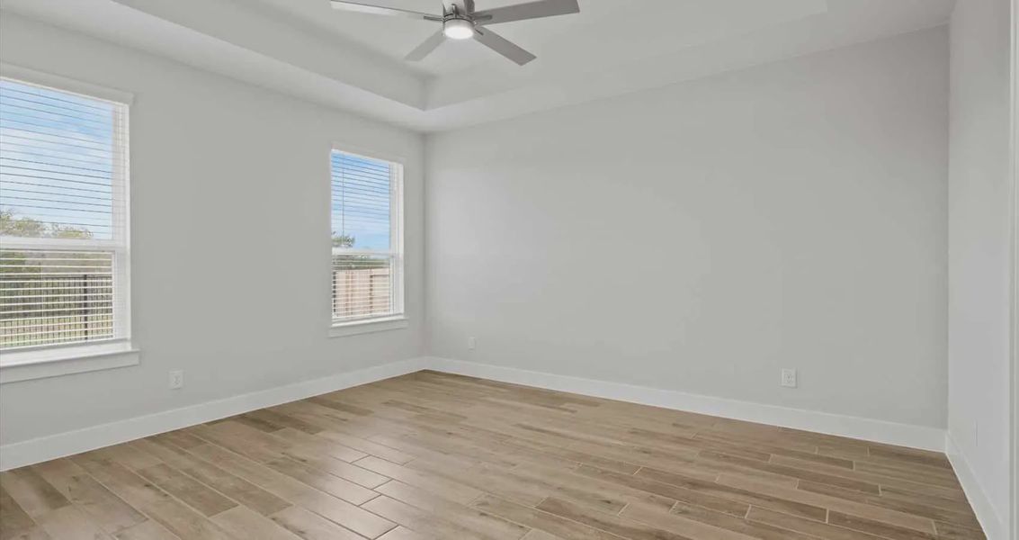 Representative unfurnished interior of a home built from the Aspen by Chesmar Homes in Village at Three Oaks, Seguin (Image 9).