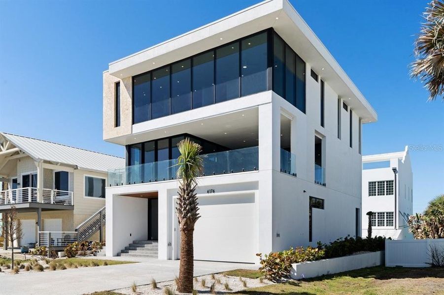 Condo located in New Smyrna Beach, FL showcasing its design and architecture (Image 6).