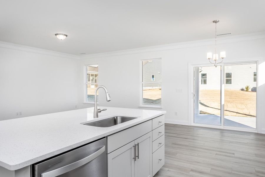 Furnished interior view inside a new home in 1158 Place, Wilson (Image 11).