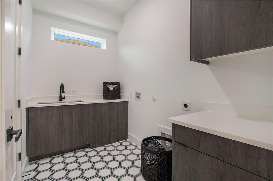 Bathroom with vanity and baseboards Bathroom with vanity and baseboards