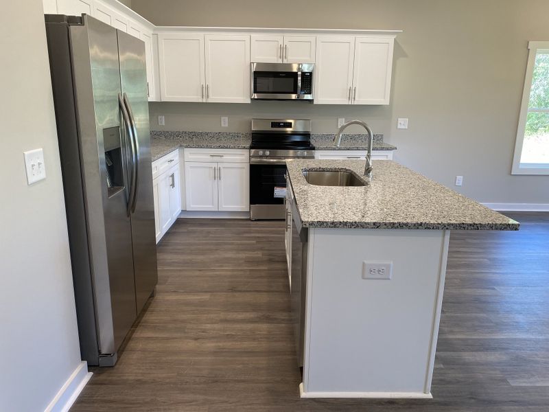 Representative furnished interior of a home built from the Hayes by Foundation Home Builders LLC in Northwyck Drive, Pikeville (Image 3).
