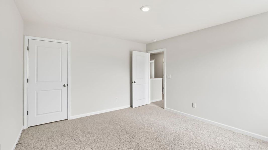 Spacious, unfurnished interior of a new home in Durbin Meadows Traditions, Fountain Inn (Image 30).