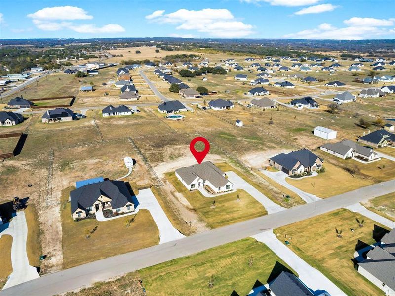Front exterior of a new home in , Weatherford, TX, highlighting curb appeal (Image 28).