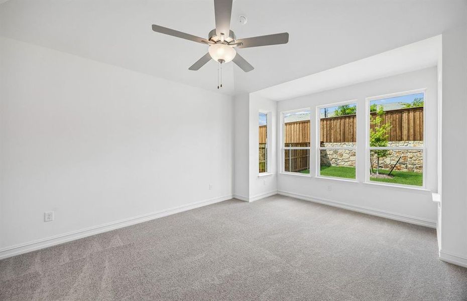 Primary suite with large windows