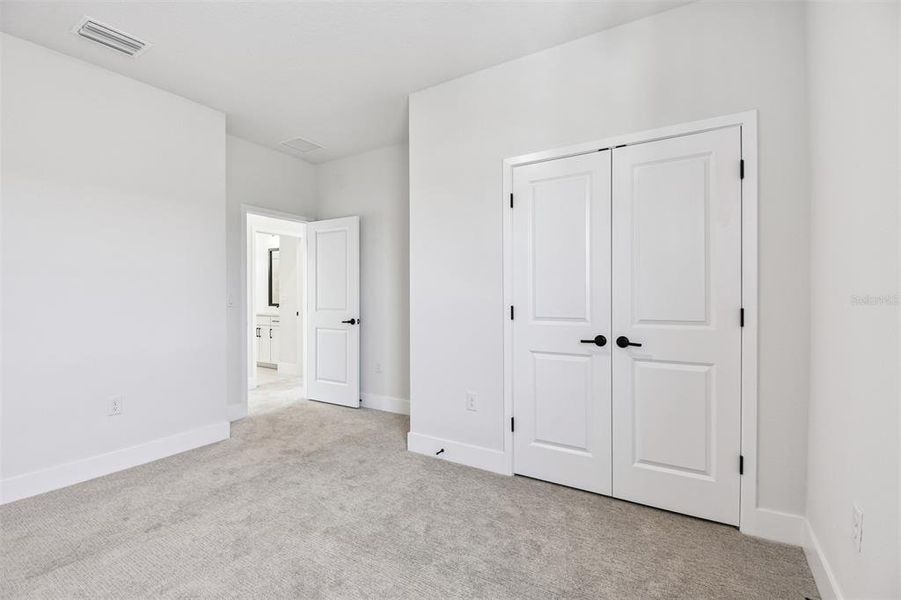 Spacious, unfurnished interior of a new home in Emerald Landing at Waterside at Lakewood Ranch – Cottage Series, Sarasota (Image 25).