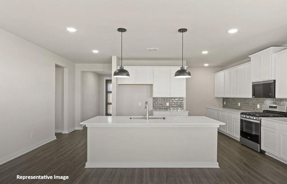 Kitchen2 - The open layout invites laughter and warmth, making it the perfect backdrop for family gatherings or cozy brunches with friends. Kitchen2 - The open layout invites laughter and warmth, making it the perfect backdrop for family gatherings or cozy brunches with friends.