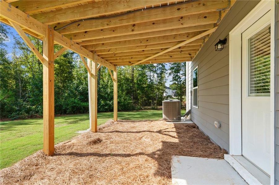 Exterior details and patio area of a home in The Woodlands Preserve, Jackson (Image 17).